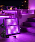 2 Pack 100W Black Light Flood Light Blacklight for Glow Party, dual lights showing intense purple illumination, outdoor usage.