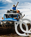 Badass Three Inch Two Bolt Exhaust Flange Connection Kit With Sealed Chrome Gaskets And Heavy Duty Hex Nuts shown with off-road vehicle.