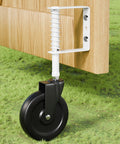 Heavy Duty 5 Inch Spring Loaded Gate Caster Smooth Operator Design For Outdoor Wooden Fences with white housing and black wheel.