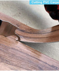 Close-up of Hemunc oscillating multitool hook blade cutting wood plank.