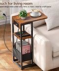 C Shaped End Table With Charging Station For Sofa And Living Room, 3 Layer Side Table With Storage Bag next to beige couch
