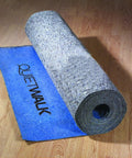 Heavy Duty Sound Dampening Underlayment Roll For Laminate And Hardwood Floors 3MM Thick showing grey roll on a brown floor.