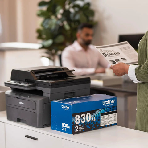 Compact Monochrome 3 In 1 Laser Printer With Copy Scan And Auto Duplex Wireless And Mobile Printing Alexa Compatible No Fuss Small Biz Workhorse For Home Office Use Includes Refresh Trial displayed on a desk