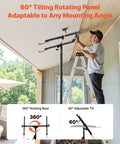 Man using VEVOR 11ft Drywall Lift Heavy Duty 150 Lbs Sheetrock Hoist with 60° adjustable tilt for ceiling installation.