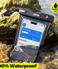 Universal Waterproof Phone Case Dry Bag Two Pack IPX8 holding phone underwater with screen visible, next to rocks