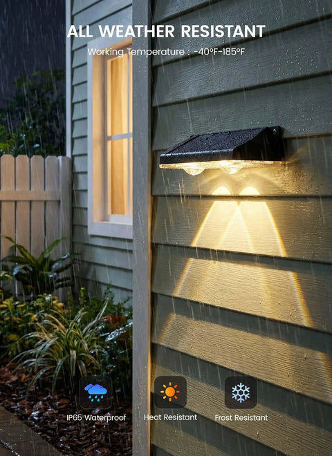 Slick Solar Fence Lights 8 Pack Weatherproof Outdoor Lamp mounted on wall in rain, showcasing dual LED glow and IP65 rating.