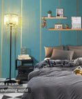 Crystal Floor Lamp With Modern Elegance In Classic Black illuminating beside a bed in a cozy bedroom setting.