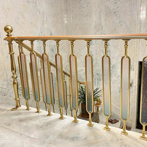 Heavy Duty Aluminum Stair Spindles With Smooth Colored Glass Panels Floor Mounted Deck And Porch Railings Set Of 10 37 Inch Tall view of elegant interior railing with gold finish and tinted glass.