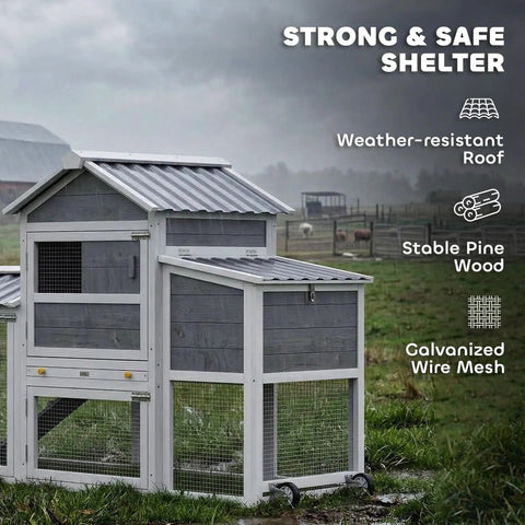 Portable Chicken Coop On Wheels With Run 80 Inch Long Wooden Hen House With Nesting Box Removable Tray And Ramp For Two To Three Hens Outdoor Poultry Cage In Gray Easy To Move with weather-resistant roof and pine wood structure in a field.