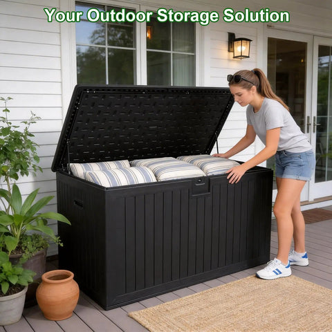 Heavy Duty 270 Gallon Outdoor Storage Box With Solid Locking Lid, Built Like A Tank For Rain Or Shine, Resin Deck Crate For Patios Yards And Pools, Keeps Cushions Locked Down Tight In Black, shown in use with cushions.