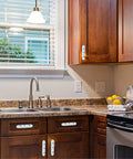 Kitchen view with Blue Starfish Cabinet Pulls 4 Pack Center To Center Three Quarter Inch Silver Nautical Drawer Handles on drawers and cabinets.