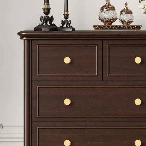 Heavyweight Solid Brass Brushed Gold Cabinet Knobs 0.94 Inch Diameter 24mm on dark wood dresser with decorative items