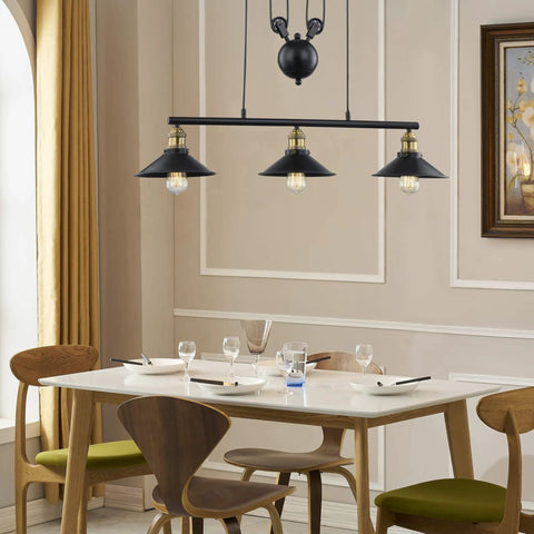 Dining room with Three Light Pulley Pendant Light For Kitchen Island And Dining Room, Lit Industrial Farmhouse Chandelier above table.