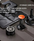 Daily Driver Barista Coffee Accessories Set Featuring Calibrated Spring Tamper Stirring Needle And Distribution Tool For Truly Smooth Espresso Pulls At Home, includes various tools on a dark surface.