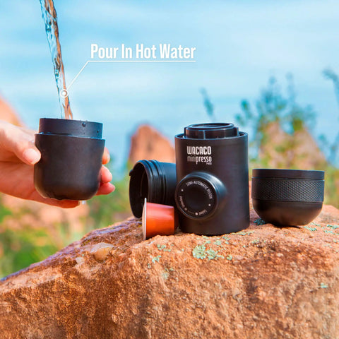 Portable Hand Powered Espresso Maker With Manual Piston Action For Travel And Office Brew Compatible With Original NS Capsules, outdoors.