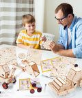 Child and adult assembling 4 In 1 Wood Building STEM Kit For Kids 8 To 12 With Tower Crane Hydraulic Loader Solar Truck and Road Roller