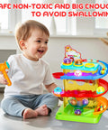 Child playing with Two In One Rolling Ball And Car Ramp Race Track For Toddlers With Sensor Lights And Light Up Balls And Mini Cars