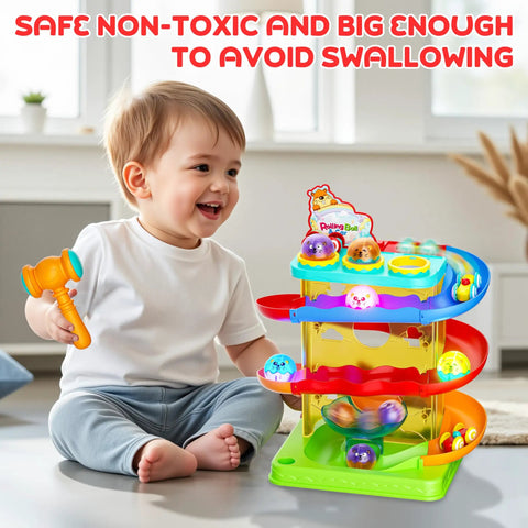 Child playing with Two In One Rolling Ball And Car Ramp Race Track For Toddlers With Sensor Lights And Light Up Balls And Mini Cars
