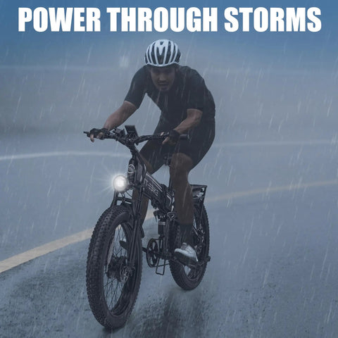 Cyclist riding Badass 9000W Dual Motor Fat Tire Ebike For Adults in rain, showcasing 26x4 fat tires on wet road