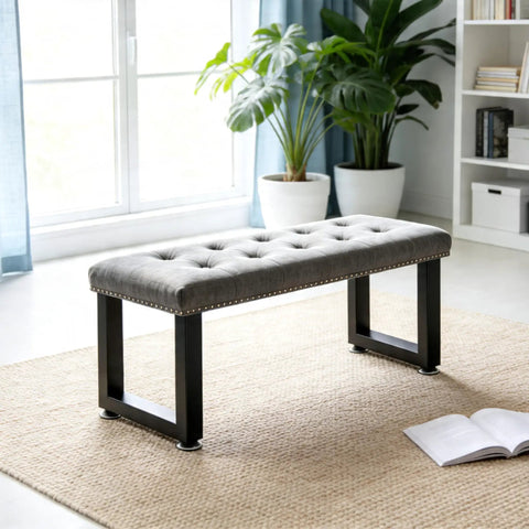 Heavy Duty Steel Table Legs 16 Inch Rock Solid Metal Bench Legs Set Of Two supporting a tufted gray bench in a modern living room.