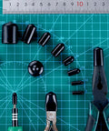 Set of 156 piece rubber end caps for bolts with a ruler, various sizes from small to large, on a blue grid cutting mat.