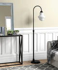Tall Floor Lamp With Glass Shade In Blackened Bronze And White Milk Finish next to couch, modern glam accent lighting for living room