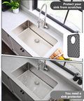 Stainless steel sink with Two Pack Silicone Sink Protectors Trellis Pattern shown in corner. Top view of modern kitchen setup.