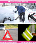 Person using multifunctional shovel, warning triangle, safety vest from Must Have Portable Car Emergency Kit With 12V Air Compressor Jumper Cables First Aid Auto Tool Set Roadside Safety Gear Winter Driving Essentials Hot Pink Kit For Women Men Teens.