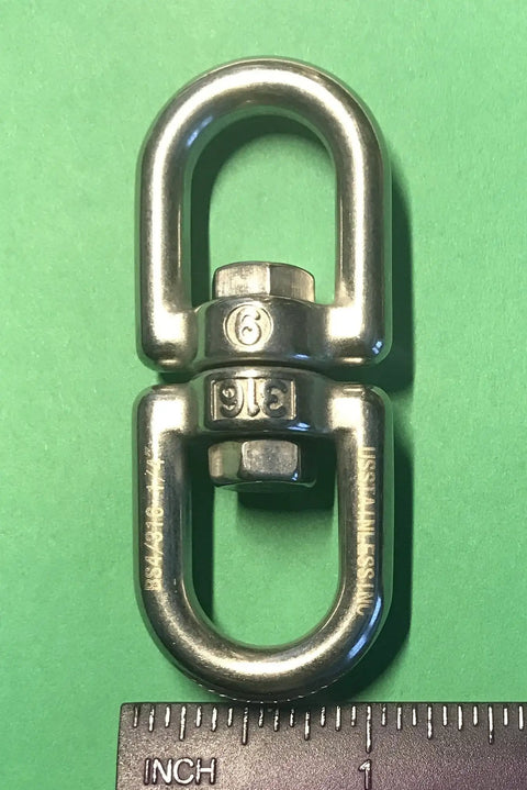 Top Shelf Marine Grade 316 Stainless Steel Anchor Swivel Eye And Eye 6mm 1/4 Inch on green background with ruler