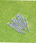 Heavy Duty Lawn Aerator Shoes With Ten Metal Spikes for Deep Soil Aeration and Healthier Grass on green grass surface