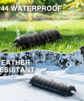 Tough As Nails Outdoor Extension Cord Cover And Weatherproof Electrical Outlet Protector Box on grass, showing IP44 waterproof feature.