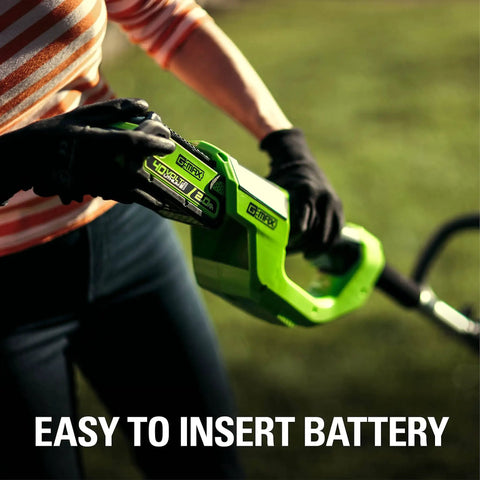 Person inserting battery into 40V Cordless String Trimmer With 12 Inch Cutting Path And Auto Feed Head Lightweight Weed Eater For Your Lawn And Yard A Real Workhorse Battery And Charger Not Included Model BST4000