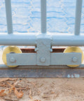 Solid 4 Inch V Groove Gate Wheel Set Heavy Duty Sliding Gate Rollers One And Three Quarters Inches Width Caster Wheels with gate installed