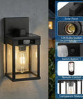 Kickass Solar Wall Lanterns With Hella Bright Motion Sensor And Three Flexible Lighting Modes For Outdoor Patio Runs Wirelessly Plus Storm Ready Build In A Quick Install Two Pack Set mounted on a wall with transparent housing.