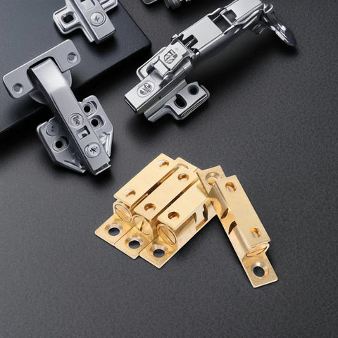 Brass Adjustable Ball Tension Roller Catch Set For Cabinet Doors And Furniture 4 Pack No Fuss Easy Install on black surface