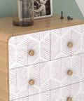 Fresh Dope Geometric Peel And Stick Wallpaper Roll With Killer Matte Stripe Design on drawer fronts of a wooden chest.
