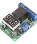 Voltage Relay Module With Upper And Lower Limit Detection, On Off Control, Over Voltage Protection, Battery Charge And Discharge Timing, 0-99.9V Display, Works With DC 12V And 24V Systems For Auto, Marine, And Solar Projects; green PCB