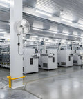 18 Inch Industrial Wall Mounted Fan With Beast Airflow installed in a warehouse, visible aluminum blade and easy controller
