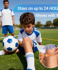 Child with Heavy Duty Waterproof Adhesive Bandages Three Quarter By Three Inch Bulk Pack playing soccer, close-up of knee bandage