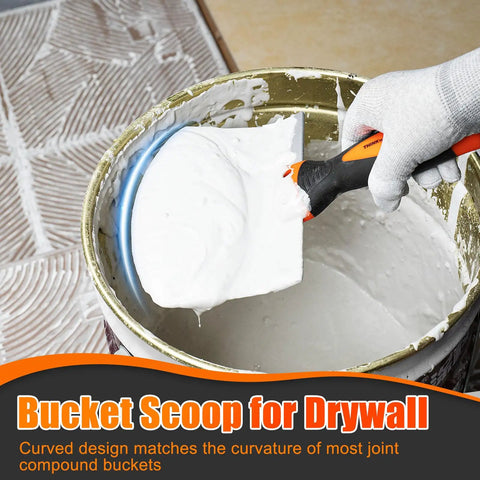 Person using bucket scoop for drywall to mix joint compound in a bucket, with glove and detailed tile background.