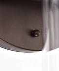 Close-up of Adair 3 Light Bath Vanity Light in oil rubbed bronze with clear glass bell shades, 24 inch wide fixture detail.