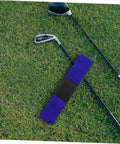 Golf Swing Analyzer Arm Training Aid And Corrector Dual Use For Practice Or Home Sessions on grass with golf clubs.