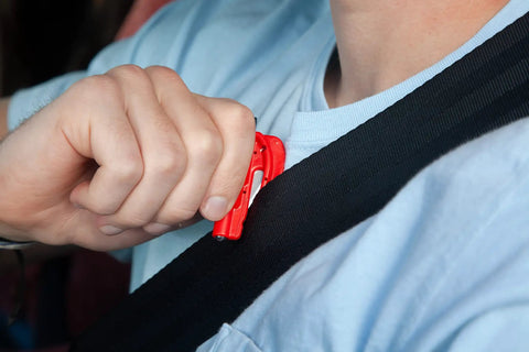 Person using 2 In 1 Emergency Car Escape Tool Keychain Hammer With Seatbelt Cutter And Window Breaker, Compact Red Lifesaver
