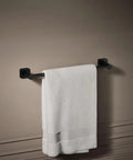 Parallel 18 Inch Towel Bar Matte Black Sleek Modern Bathroom Hardware with towel hanging in classic space