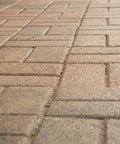 Premium Patio Paver Sealer Low Gloss Water Based Clear Stone Sealant Tough As Nails For Driveways on textured paver surface.