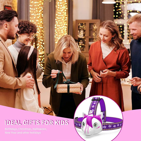 Unicorn LED Headlamp for Kids and Adults displayed as gift at a holiday party setting, 3 lighting modes, adjustable headband.