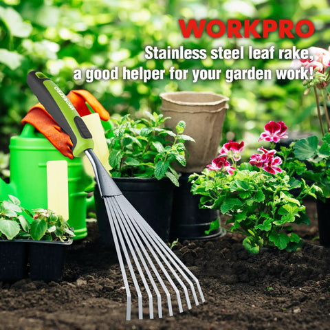 Handy 16 Inch Compact Stainless Steel Hand Rake With Soft Grip Handle Versatile Small Garden Rake For Delicate Plants Leaves Mulch Spreading And Light Soil Tilling In Narrow Beds And Flower Borders in a garden scene with various plants and pots.