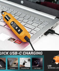 GINELSON cordless rotary tool in yellow with USB-C charging, on laptop keyboard