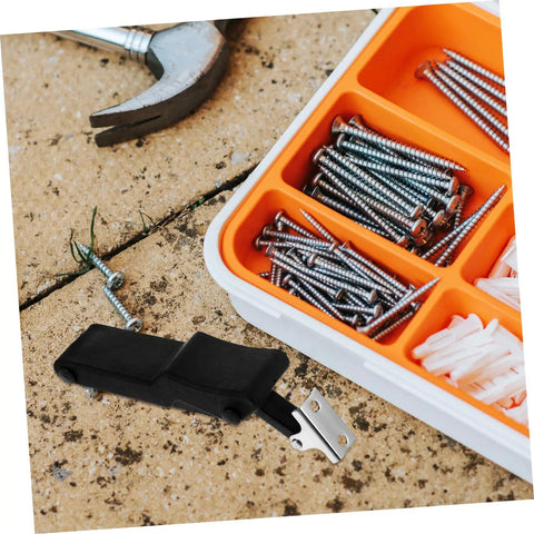 Flexible Spring Latch Car Hood Catch Heavy Duty Elastic Draw Latch next to toolbox with screws and hammer on paving stone