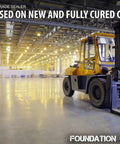 Tough As Nails Sodium Silicate Concrete Sealer And Surface Hardener Concentrate Five Gallon Bulk Bucket in a large warehouse with a forklift.
